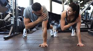 Toning Bingo Wings: Your Ultimate Guide to Sculpting Sleek Arms at the Gym 3 Fitness trainer demonstrating arm toning exercises Nazeing