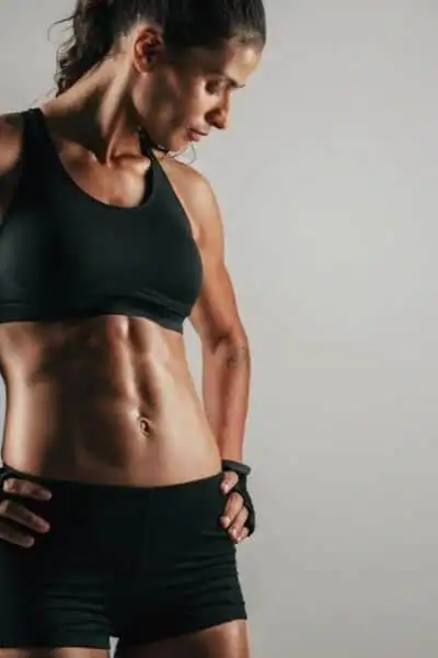 Toning Up at Home: The Ultimate Guide to Bodyweight Exercises 2 Image of woman's toned stomach after bodyweight exercises Nazeing and non-surgical treatment from Lipo 360