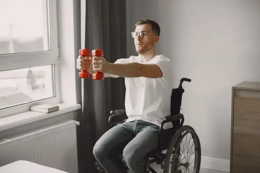 Empowering Weight Loss: A Comprehensive Guide for Individuals with Disabilities 1 Image of man doing exercise in his wheelchair to aid weight loss Nazeing