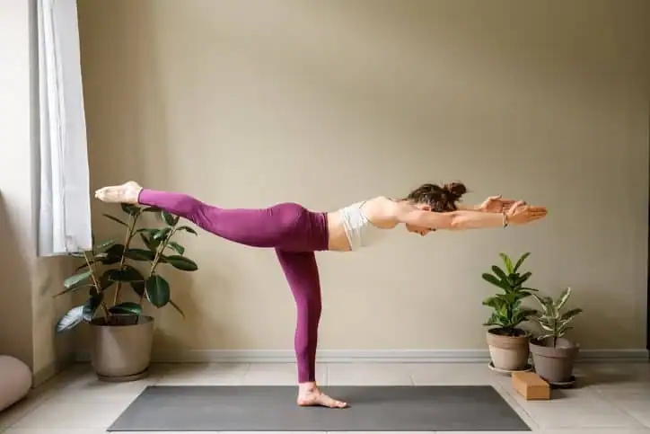 Achieving the Perfect Tone: How Often Should You Exercise for Results? 1 Woman doing Yoga exercise Nazeing to help with toning the body.