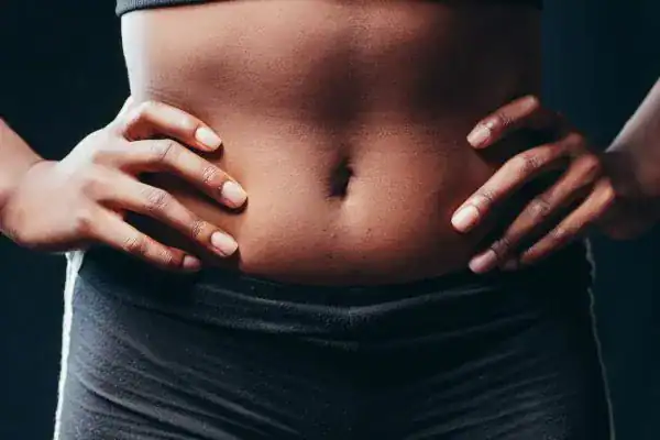 Toning Your Stomach: The Ultimate Guide to Achieving a Sculpted Stomach While Shedding Pounds 1 Image of a toned stomach after non surgical treatment Nazeing
